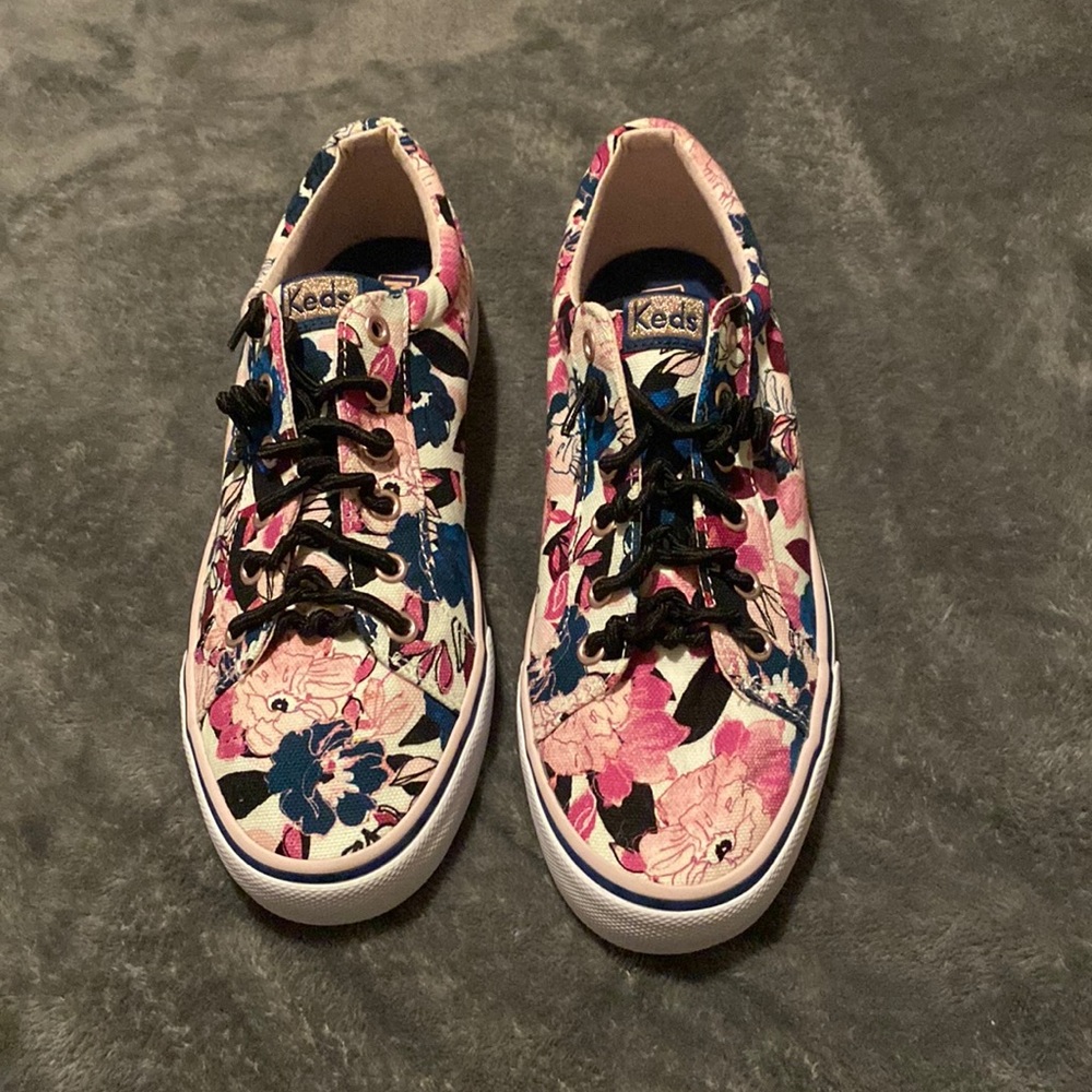 pink and blue flowery slip on keds